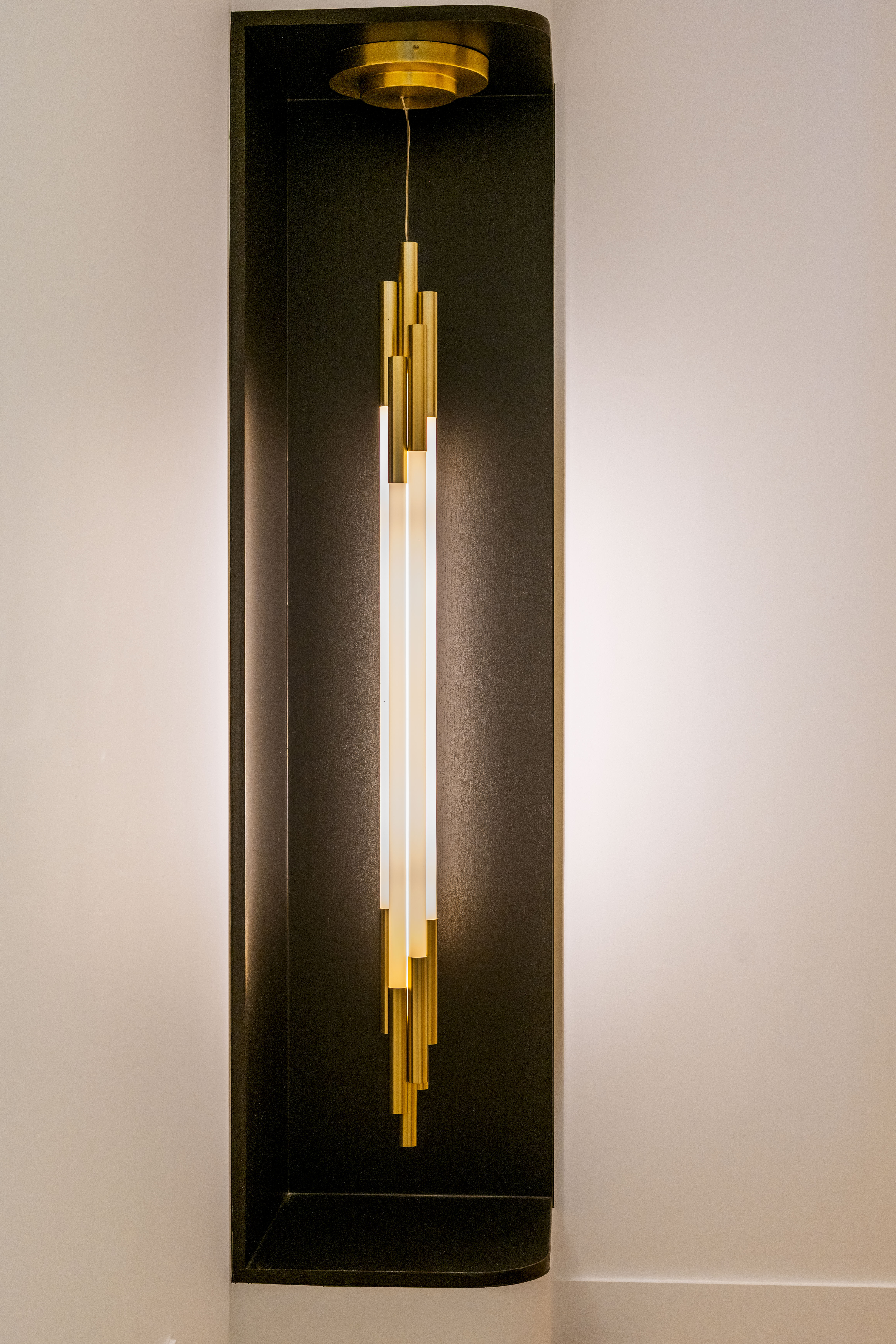Sculptural brass pendant light